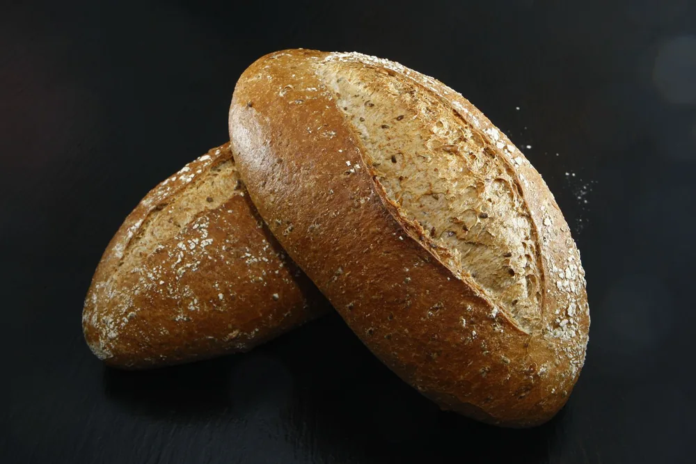 Rustic sourdough loaves with a flour-dusted crust
